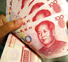 В КНР объем трансграничных сделок в юанях достиг $1,38 трлн